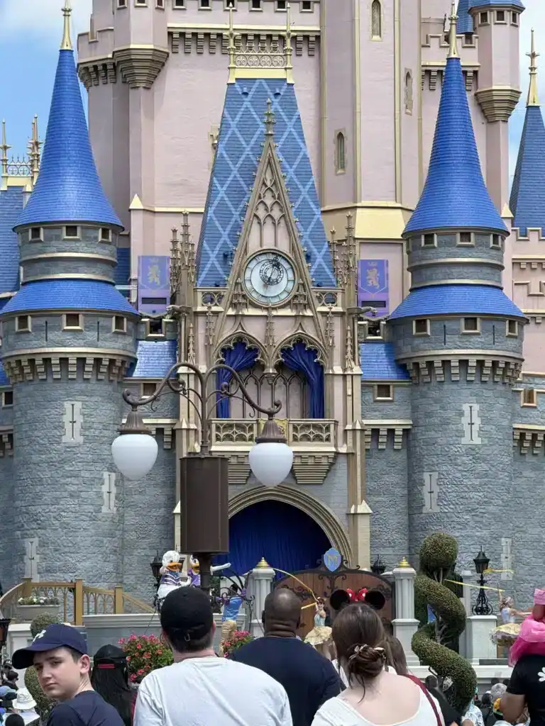 Enjoying Cinderella's Castle at Magic Kingdom parks after buying discount tickets with points