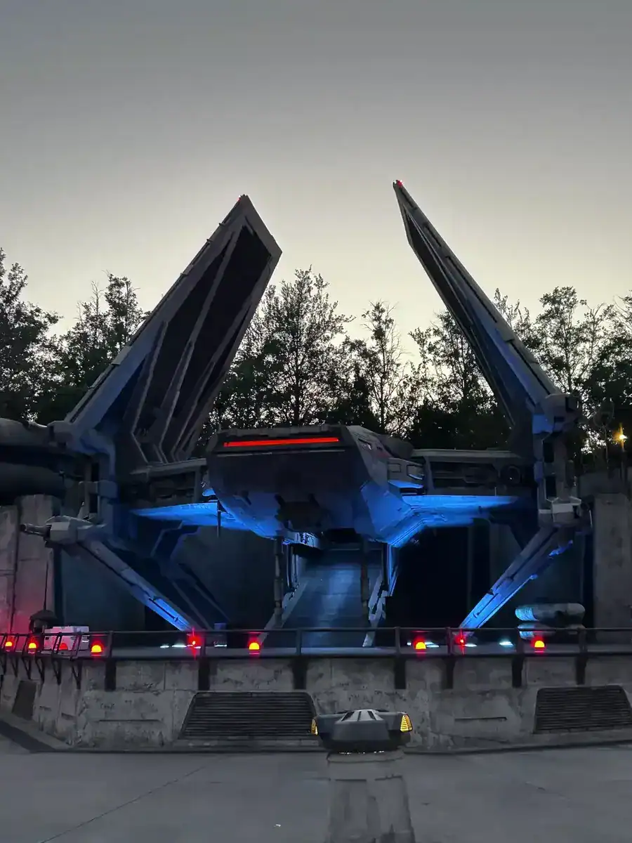 Disney's Galaxy's Edge at night showing how to book Disney with credit card points