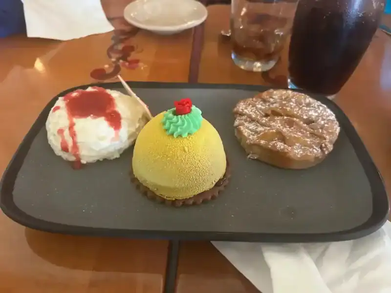 Princess dining desert at Epcot- Save up gift cards using TopCashBack app to save up for character dining.